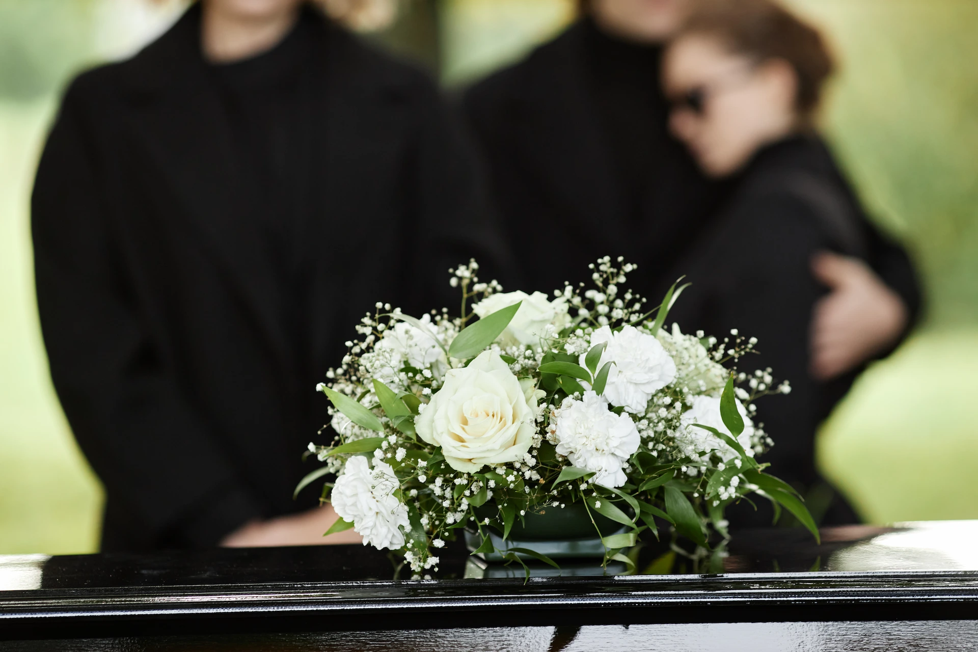 White sympathy flower arrangement for a funeral in Dublin