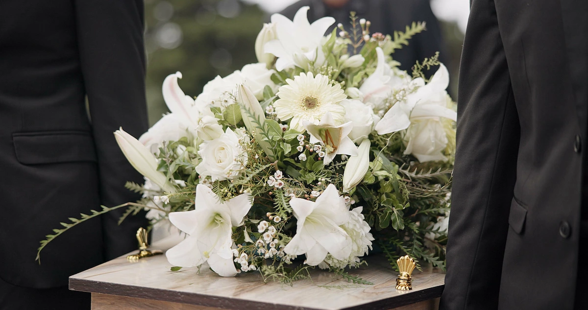 White sympathy flower arrangement